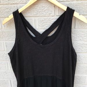 Left of center sleeveless dress.